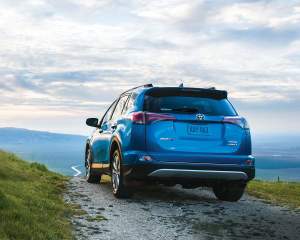 toyota-2017-rav4-hybrid-limited-electric-storm-blue-rear-l